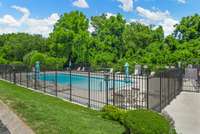 Residents can enjoy community amenities including access to a pool during the warmer months, a clubhouse featuring a workout facility, and private spaces available for event rentals.