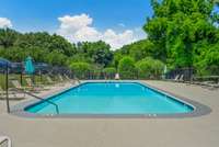 Residents can enjoy community amenities including access to a pool during the warmer months, a clubhouse featuring a workout facility, and private spaces available for event rentals.