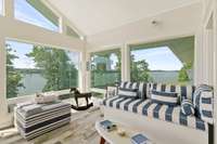 The sun room is the ultimate spot to spend time watching the water and the wildlife just outside.