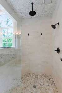 Large tile shower with rain head