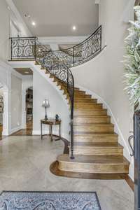 Grand entrance with this winding staircase