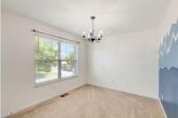 Front Upstairs Bedroom with 2-inch Blinds.