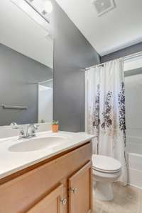 Upstairs Full Bath with Maple Wood Vanity and Linen Closet