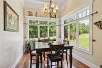 Attached to the Kitchen is this large bright dining space with beautiful views of the countryside and grounds.