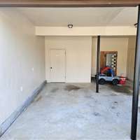 Carport with storage area.