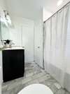 Linen Closet in Bathroom perfect for storage.