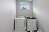 Upstairs laundry room.