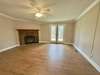 Wood burning fireplace in living area.