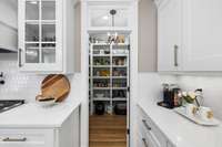 Large walk in pantry for storage.