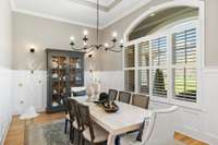 Formal Dining Room With Decorative Ceiling and Loads of Trim Work