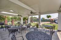 Enjoy dining on the grilling pavilion terrace pool-side. Resort style living - right at home!