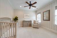 This bedroom has pretty wallpaper and fluffy soft carpeting to welcome your residents.