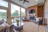 Step from the porch to the newly installed deck with stairs to the lower level entertaining space. Grill on the open deck, only steps away from your Kitchen.