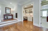 There are two staircases to take you to the second level of the home with more hardwood floors on the central landing area.