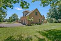 Oversized 2 car garage.. with a "man" door too.. the inside is also equipped with a ramped entry into the home.. come see it!