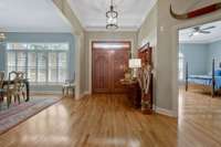 Gleaming hardwoods.. note the plantation shutters..