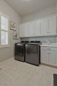 Very nice laundry/utility room with sink..