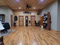 Center of the open space facing the 2nd and 3rd bedrooms and 2nd Bath.