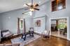 Living room has so much natural light with 2 windows and skylights