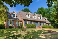 Gorgeous all brick home with 50 +/- acres!!!