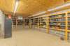 Inside storage barn.  Concrete floors and lighting!