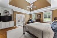 Primary Bedroom with views of the patio & back yard