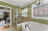 Primary Bathroom with upgraded tiled Walk-In Shower and Soaking Jacuzzi Garden Tub