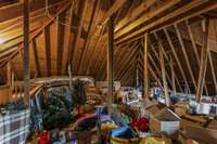 Large Attic area with easy access. It's actually the 3rd floor to this house. Endless possibilities what you could do with this much room - Storage, Office, Another Bedroom, etc