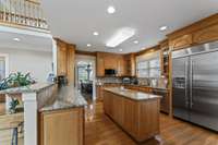 Solid Surface Countertops, Back Splash and Spacious Eat-In Area