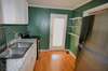 Kitchen with stove and fridge