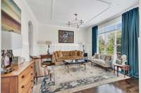 Formal dining room currently being used as a living room