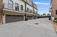 Access to attached garage is off the alley just south of the building.  The shared mailbox and package depository is located in this area as well.