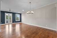 Dining area into the living room; these windows face 5th Avenue.