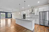 Open floorplan makes entertaining a breeze ... the large kitchen island combined with the dining and living space makes this floor a dream for entertaining and everyday life.