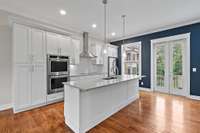 Kitchen in open floor plan on 2nd floor, overlooking the common area.