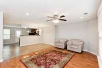 Original photo of Living Room, Dining Room, and Kitchen. Viewed from entry foyer.