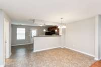 Original photo of Dining Room and Kitchen.