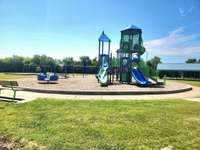 Take the sidewalk to Veteran's Memorial Park playground, just a short walk from home.