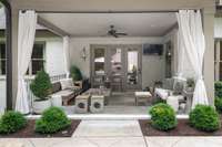 Backyard oasis features wonderful cabana porch, outdoor dining and wood burning fireplace (w/gas).