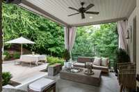 Backyard oasis features wonderful cabana porch, outdoor dining and wood burning fireplace (w/gas).