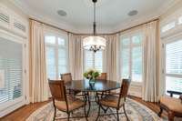 Breakfast area with bay windows.