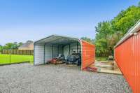 This carport also features electricity as well as additional storage space for vehicles! 8699 Christiana Fosterville Rd   Christiana, TN  37037