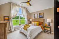 Bedroom 2 enhanced by a ceiling fan and carpet flooring, creating a cozy and comfortable atmosphere. 8699 Christiana Fosterville Rd   Christiana, TN  37037