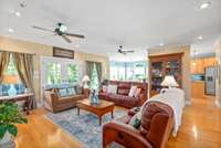 Large living room opens to the kitchen and covered patio.