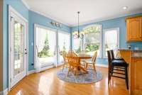 Enjoy this eat-in kitchen with views of the yard.