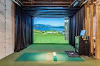 Equipped with HD Golf and a sports simulator, along with back and side view cameras for detailed analysis, this space is perfect for both practice and entertainment.