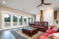 Notice the wall of glass allowing lots of natural life in the walk out Basement