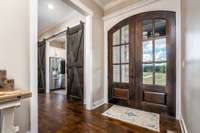 Double Entry Doors with 6-pane windows for natural light