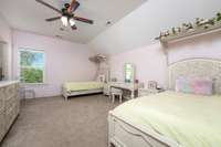 One of the 2 bedrooms located upstairs. With 2 walk in closets