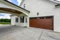 The porte cochere leading to the 2nd garage. Making this house a 4 car garage!